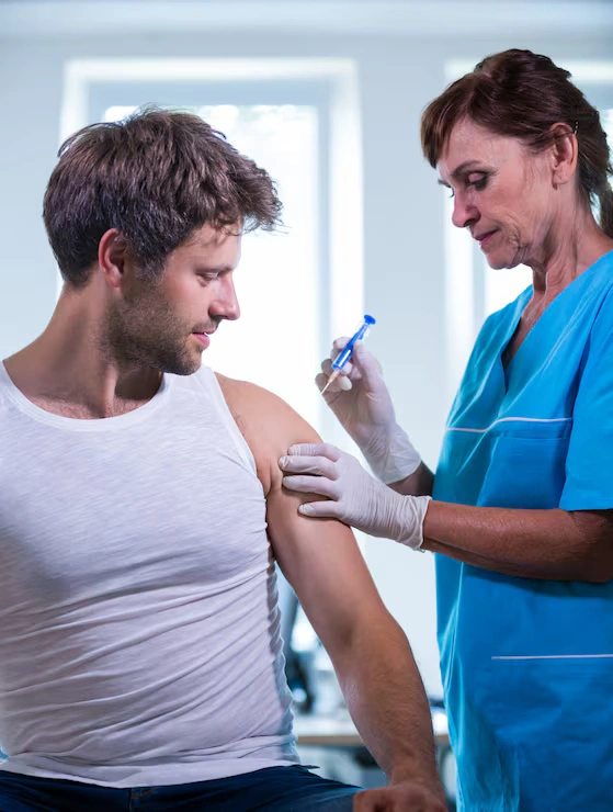 female-doctor-giving-injection-patient_1170-2130